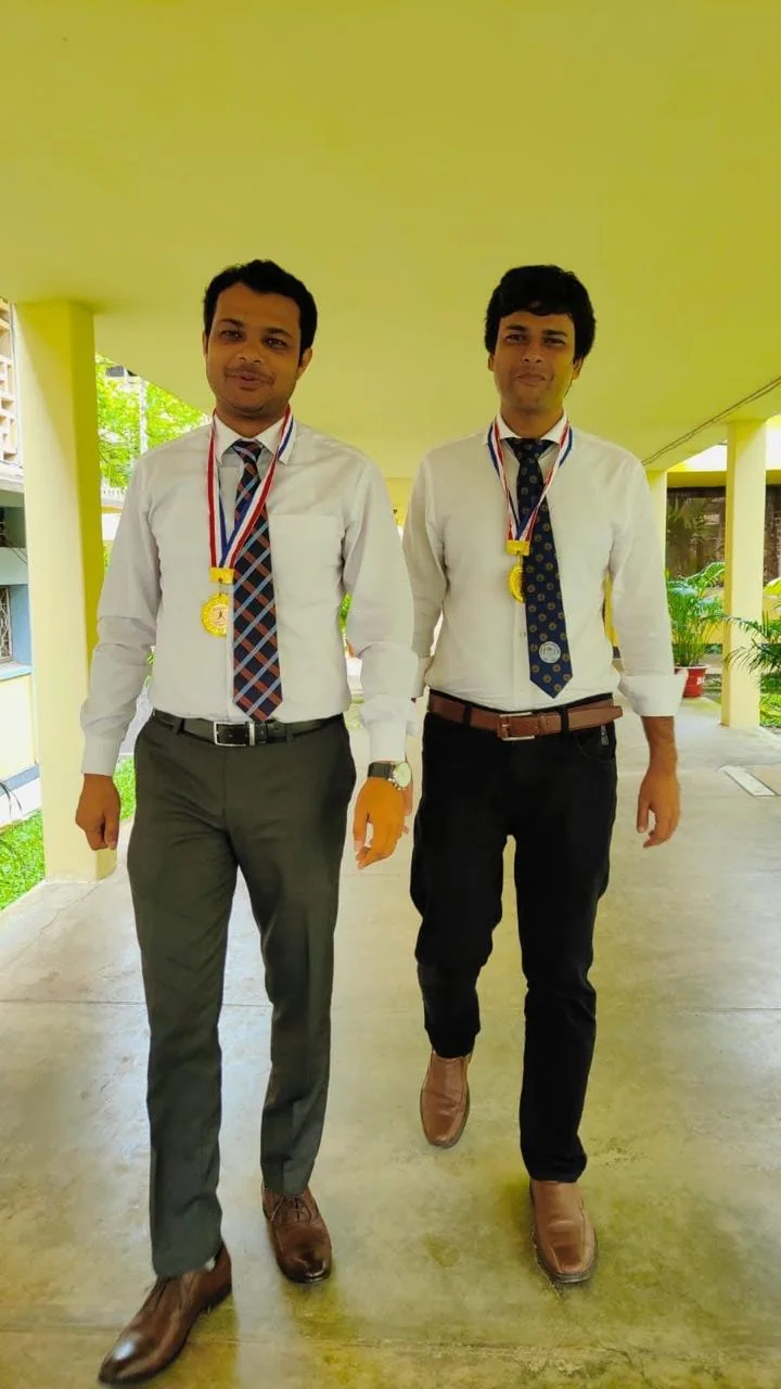 Dr Najmul Hasan with a colleague during an earlier professional milestone