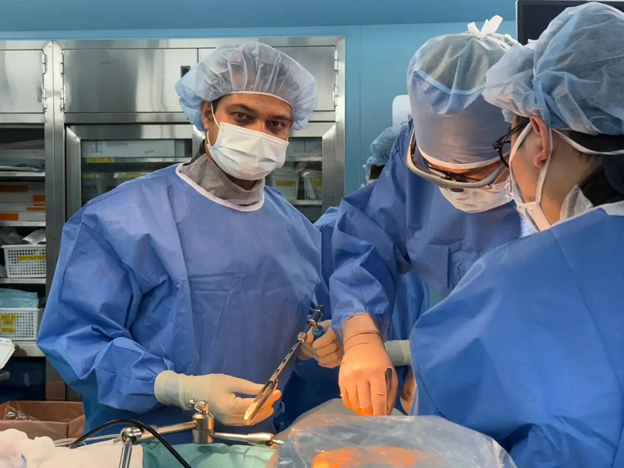 Dr Najmul Hasan participating in an orthopaedic surgery